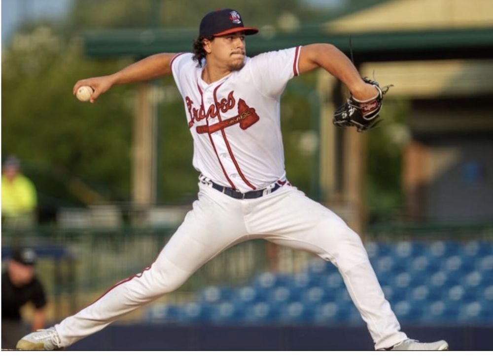 Cedric De Grandpre pitching in a game