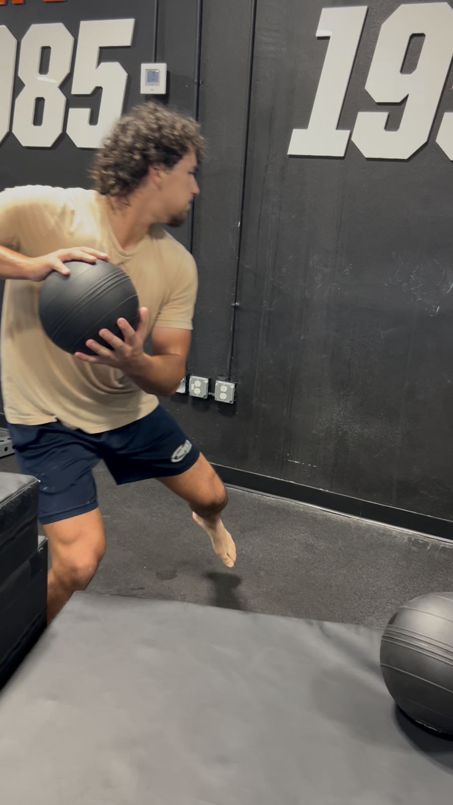 Cedric De Grandpre doing rotational medicine ball throws