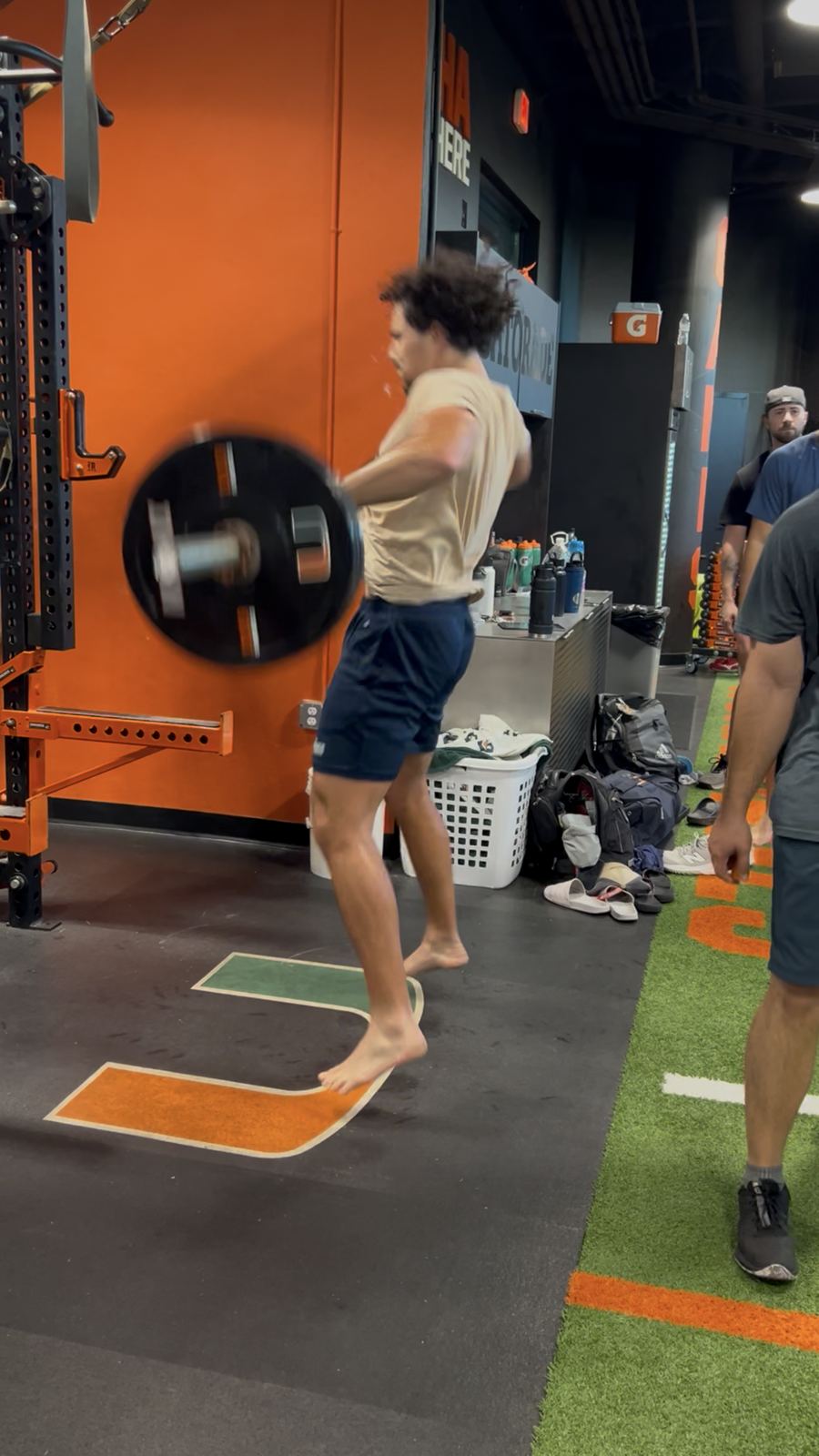 Cedric De Grandpre snatching a barbell