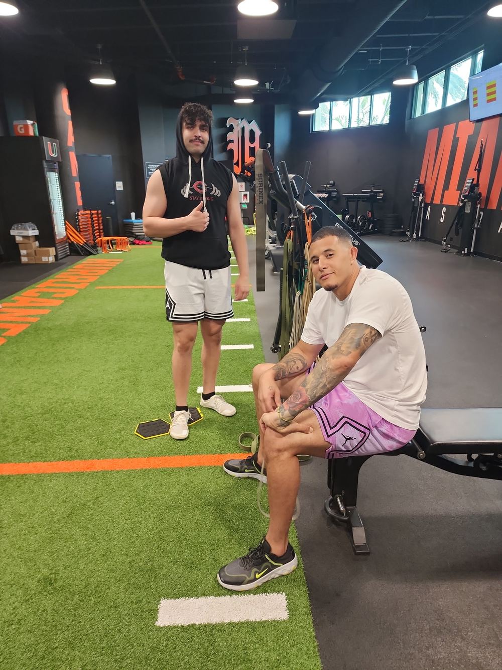 Sal Stewart and Manny Machado resting between sets